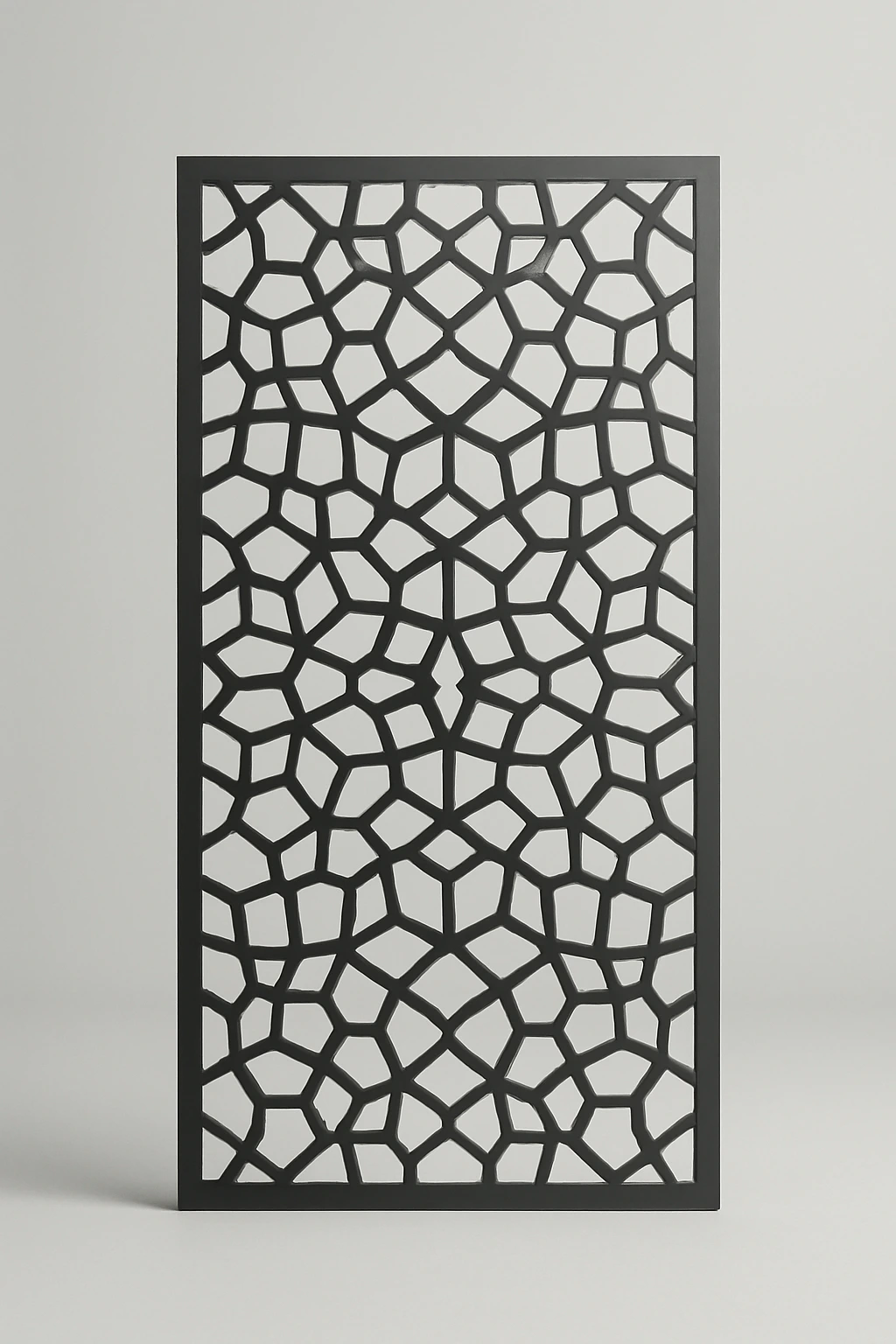 Mosaic geometric pattern, a laser-cut steel decorative screen panel in matte black