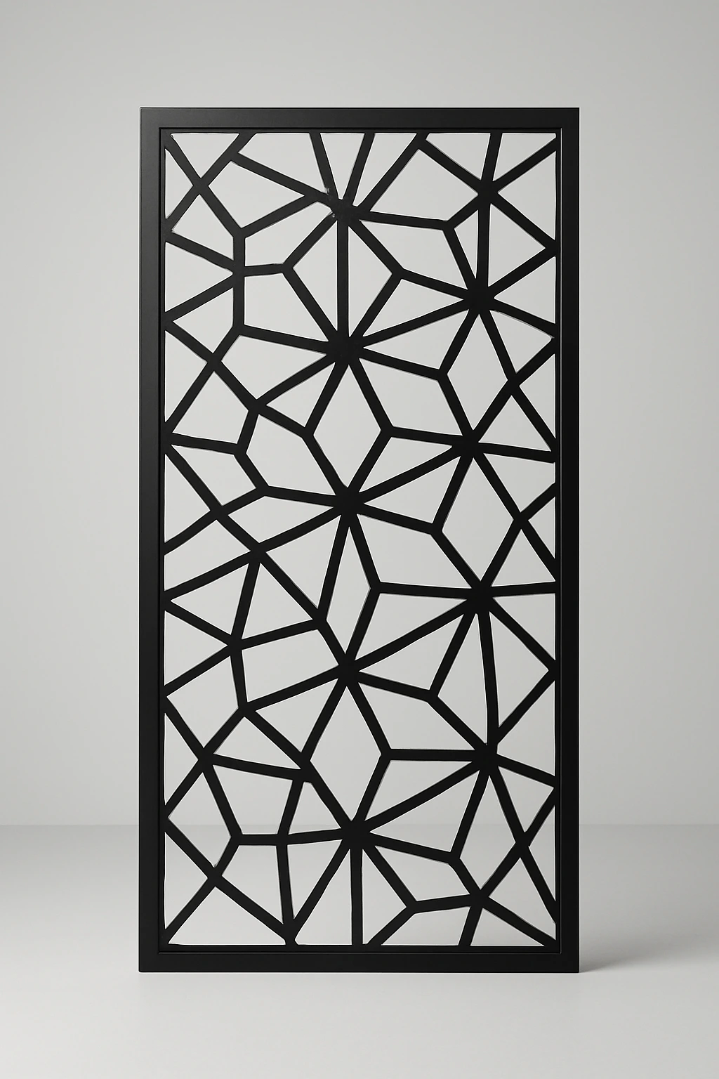 Facet geometric pattern, a laser-cut steel decorative screen panel in matte black