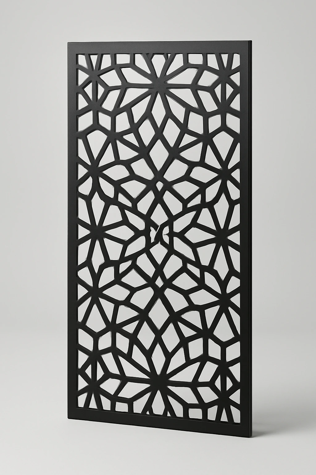 Tessera geometric pattern, a laser-cut steel decorative screen panel in matte black