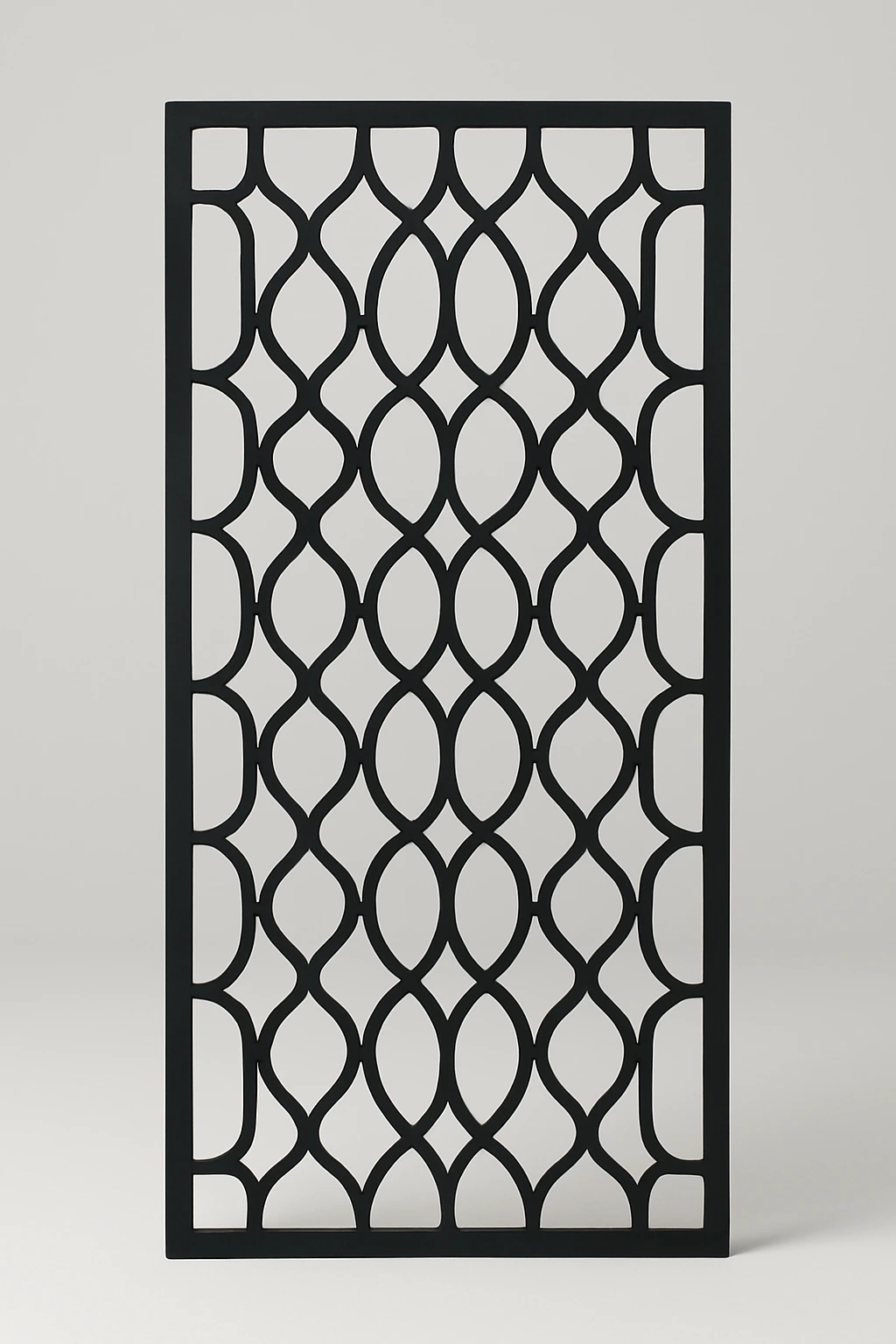 Teardrop lattice pattern, a laser-cut steel decorative screen panel in matte black